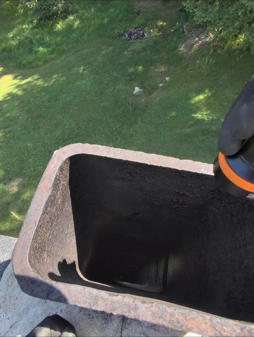 The chimney flue after soot has been removed